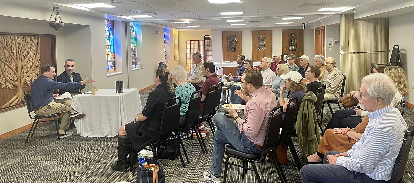 Mustafa and Evan on the panel